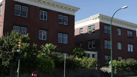 Brick apartment building establisher day Stock Footage 146821553