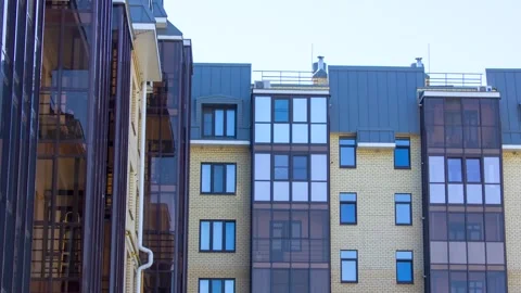 Brick apartment building. Red brick house with windows. City balcony, animation Stock Footage 340795504
