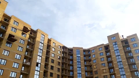 Brick apartment building, under construction. Modern urban apartment house Stock Footage 280441104