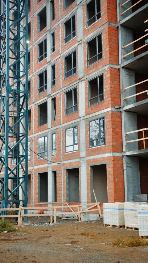 Brick Apartment Building Under Construction Video stock 296755054