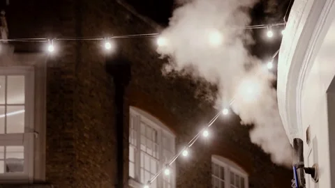 Brick Architecture, String Lights, Water Vapor, Steam Plume, Night, London Video stock 324758457