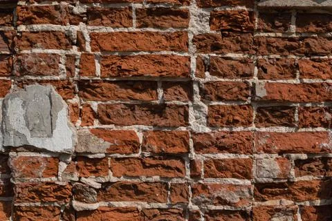 Brick background. Old red brick wall. Architectural elements. Horizontal phot Stock Photos