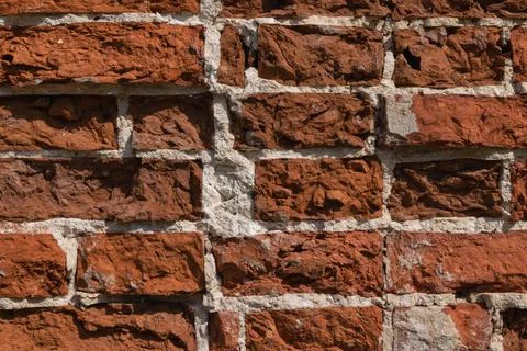 Brick background. Old red brick wall. Architectural elements. Horizontal phot Stock Photos