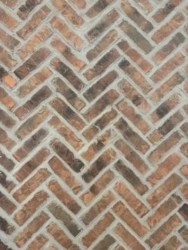 Brick background unique diagonal arrow pattern Stock Photos