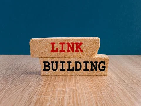 Brick blocks with text LINK BUILDING. Beautiful blue background, Foto stock