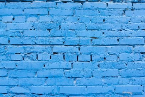 Brick blue background, texture of old brickwork painted blue Stock Photos