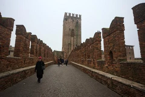 Brick bridge and a tower Stock Photos