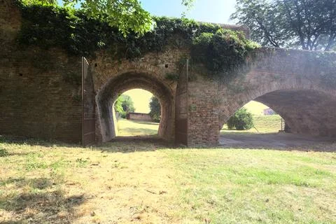 Brick bridge in a garden Stock Photos