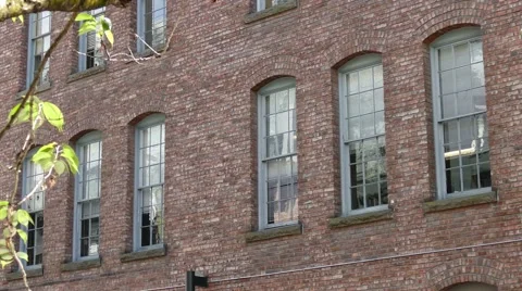 Brick building front wall with windows, English style Video stock 62763156