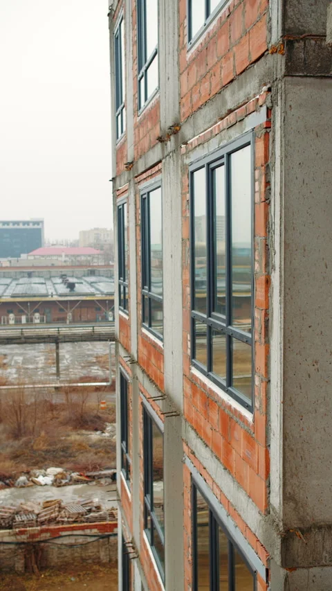Brick Building with Installed Glass Windows Stock Footage 296755235