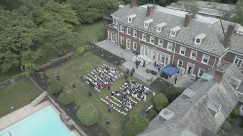 Brick Building school graduation drone shot Stock Footage 306825744