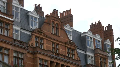 Brick building with windows and chimneys in London Stock Footage 60819212