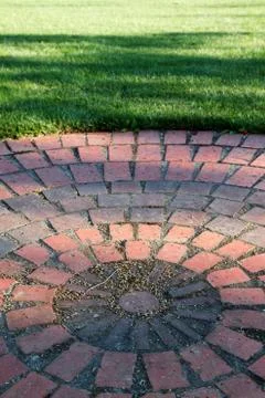 Brick circle and grass Stock Photos