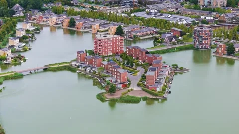 Brick clad residential complexes modern apartment towers clustered artificial Video stock 327669313