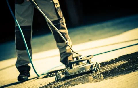 Brick Cleaning Using Mechanic Brush Cleaning System with High Pressure Water Stock Photos