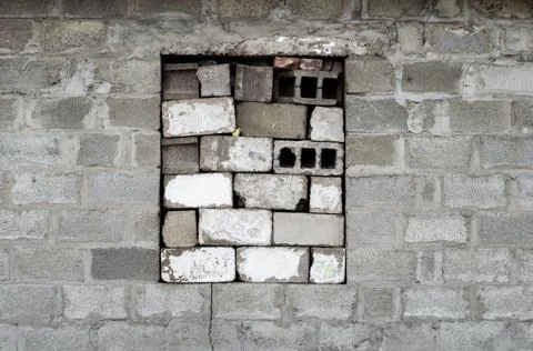Brick closed window of an old building close up Foto stock