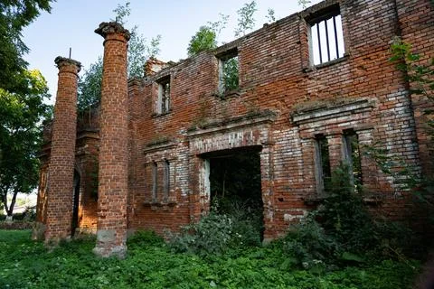 Brick columns in the old stable. 19th century buildings. Stock Photos