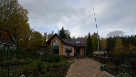 Brick cottage in the forest, time-lapse video of a house in the forest Stock Footage 195980402