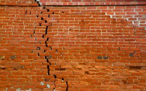Brick crack in the wall Stock Photos