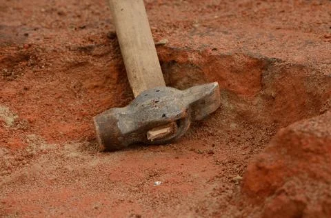 Brick Crumb With Hammer Background Foto stock