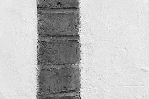 Brick Edge between Two Plaster Fields  Minimalist Detail Stock-Fotos