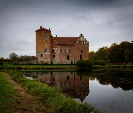 The brick facade with old windows of Torup Castle Foto stock