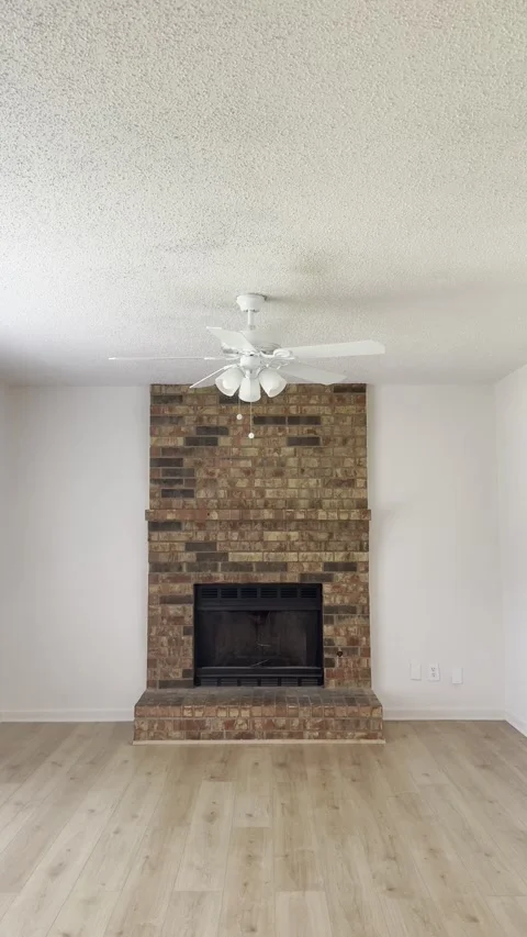 Brick Fireplace in Empty Living Room Interior Stock Footage 345844949