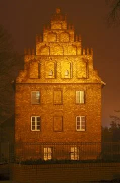 Brick gothic facade of the building Stock Photos