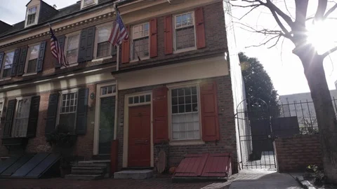 Brick House with American Flags Stock Footage 113069498