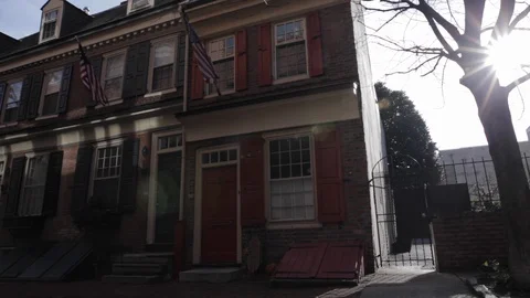 Brick House with American Flags Stock Footage 113069530