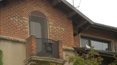 Brick house with balcony in Bucharest Stock Footage 58089127