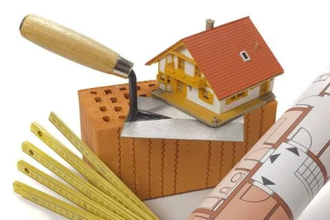 Brick for house construction and tools isolated over white background bric... Fotos de archivo