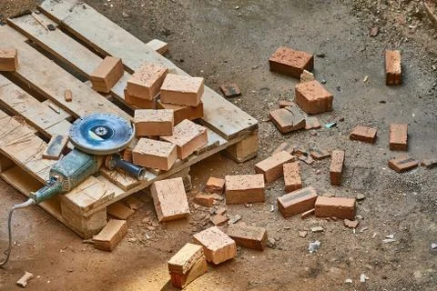 Brick House Construction, Cutting bricks Stock Photos