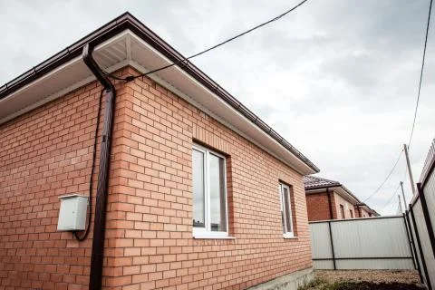 Brick house Wall Facade. construction of houses. cottage red brick house Stock Photos