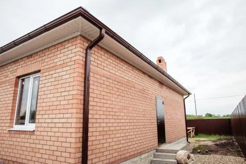 Brick house Wall Facade. construction of houses. cottage red brick house Stock Photos