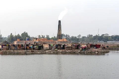 Brick Kiln Settlement by the Riverside in Rural Area Stock Photos