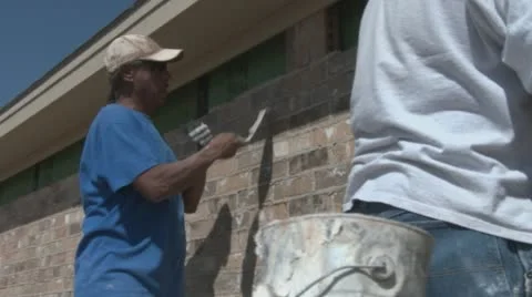 Brick layers construct new house in Texas Stock Footage 61013430