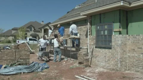 Brick layers construct new house in Texas Stock Footage 61014673
