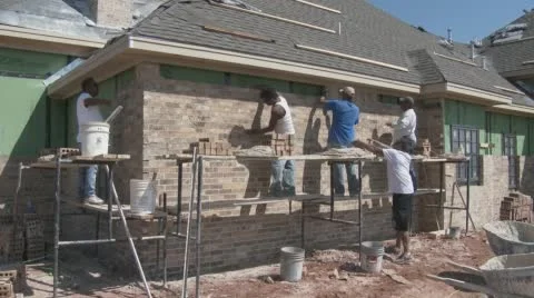Brick layers construct new house in Texas  Stock Footage 61033749