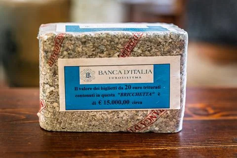 Brick made of shredded bank notes from the Banca d Italia in Florence, Italy Stock Photos