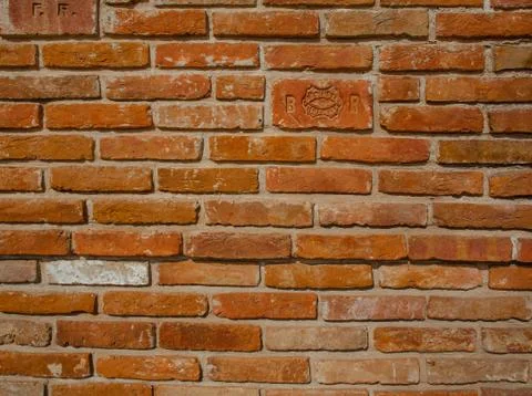 Brick masonry surface, assorted shapes and colors of the base object Stock Photos