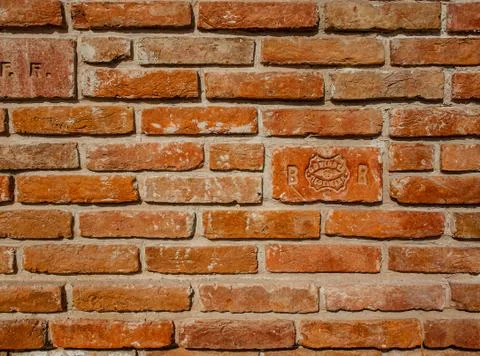 Brick masonry surface, assorted shapes with an interesting pattern of decorat Stock-Fotos