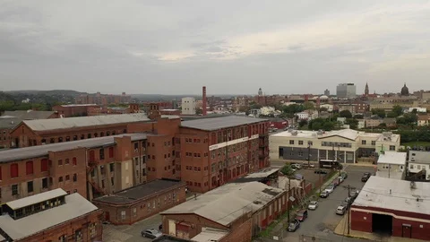 Brick mill complex with the Paterson skyline behind Vídeos de archivo 95960720