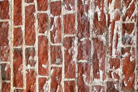 Brick old wall with knocked down facade Stock Photos