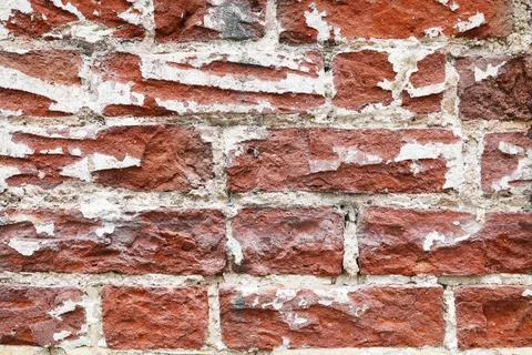 Brick old wall with knocked down facade Stock Photos