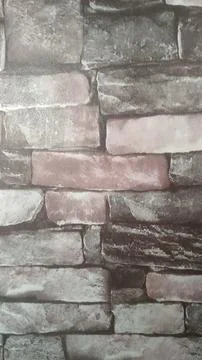 The brick pattern is reddish brown and gray with dark grout lines Stock Photos