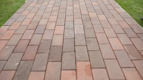 Brick pavement texture pattern forming a repeating background Stock Footage 322905903
