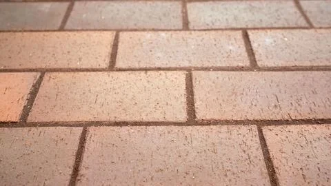 Brick pavement texture pattern forming a repeating background 스톡 사진