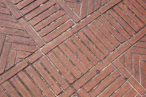 Brick pavement tile, top view. Urban texture as background. Stock Photos