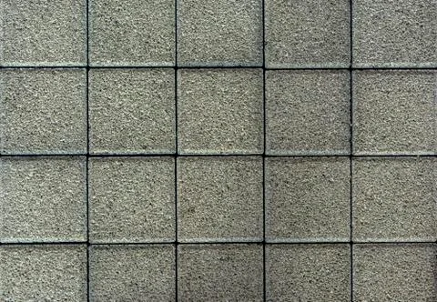 Brick pavement tile, top view. Urban texture as background. Stone pavement Stock Photos